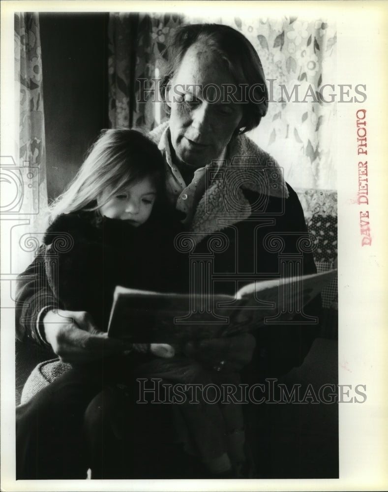 William James Reads Book to Little Girl - Historic Images