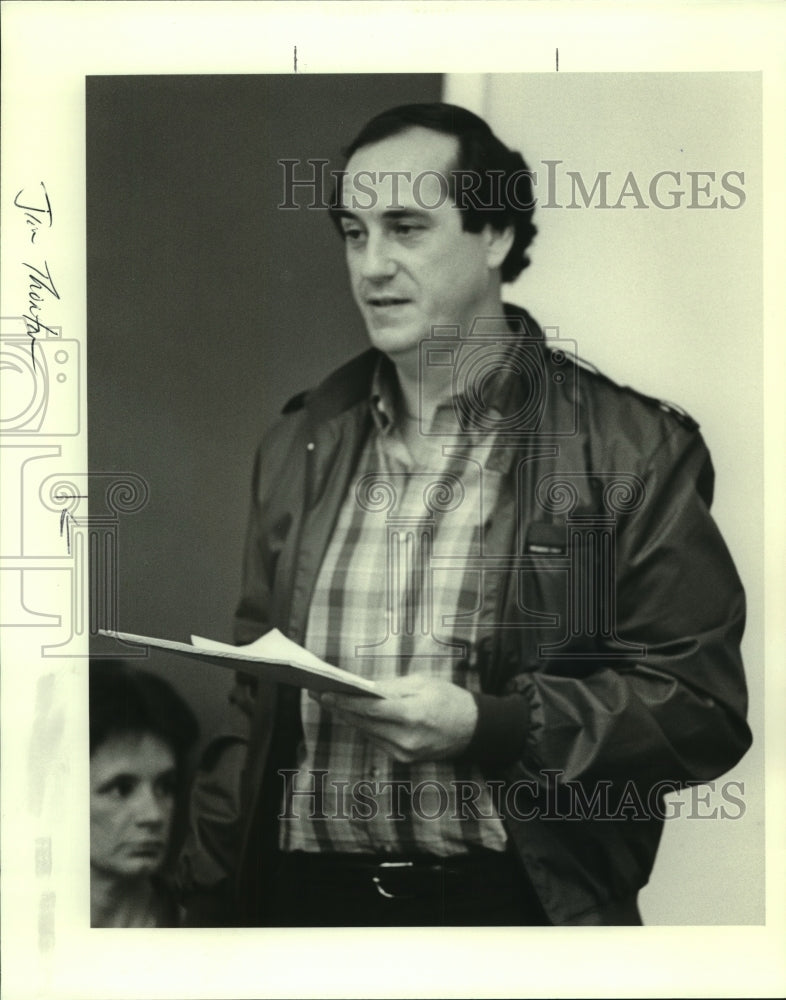 Jim Thornton with Paper - Historic Images