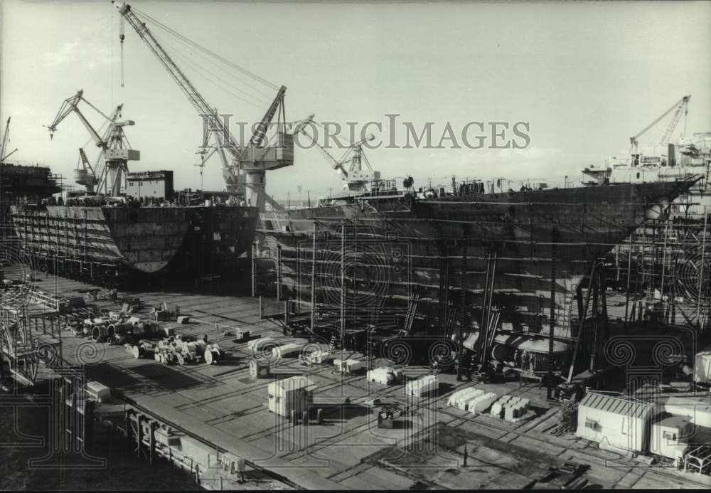 View of the construction of ship hulls by Ingalls Shipbuilding - Historic Images