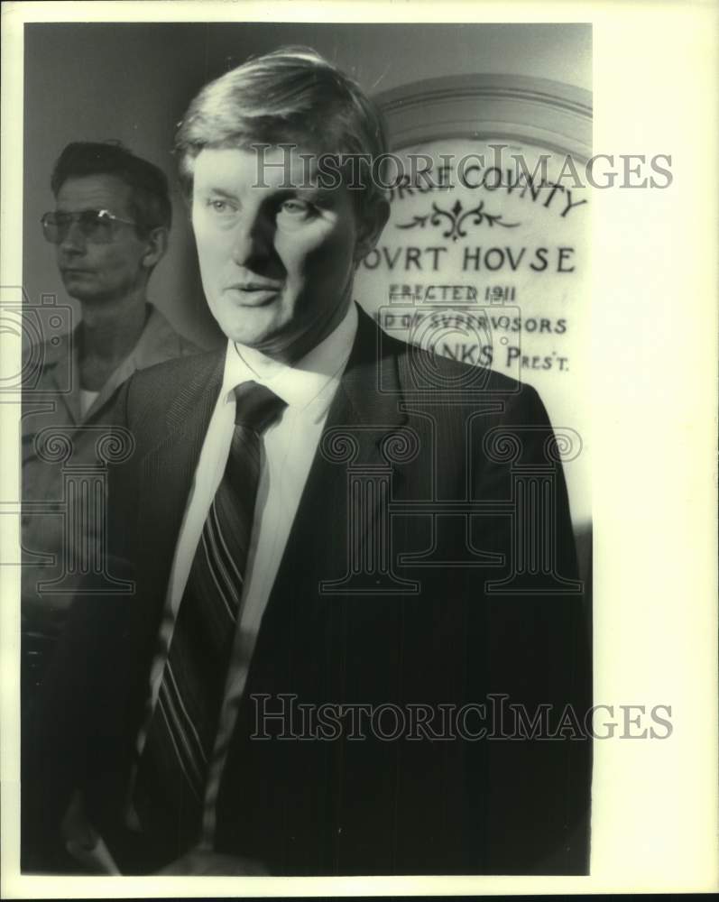 Man in suit in courthouse regarding Bethel Baptist Church, MS - Historic Images