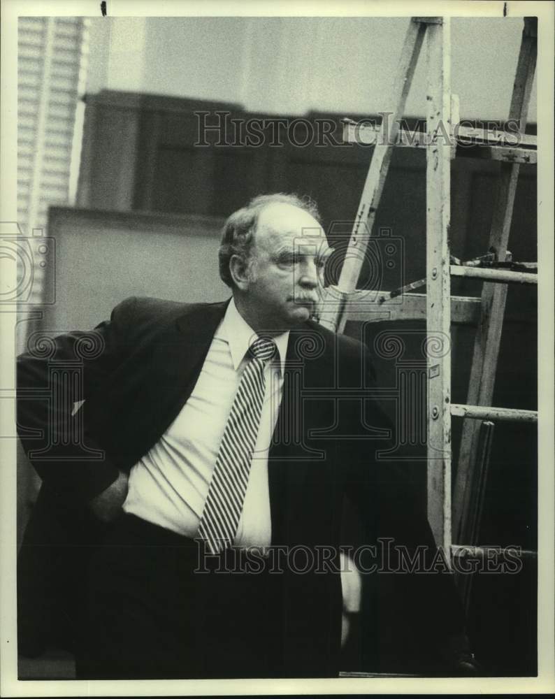 Press Photo Man stands next to ladder at Supervisor&#39;s Trial - Historic Images