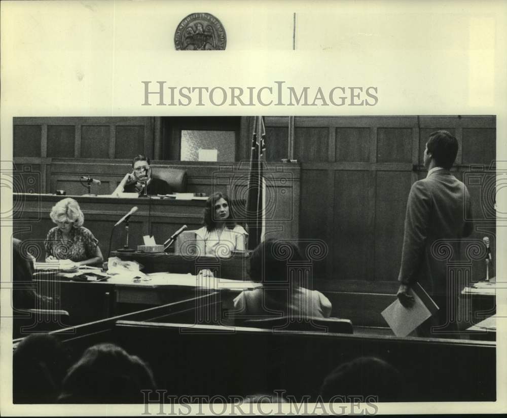 Press Photo Man stands at Supervisor&#39;s Trial while Judge listens - Historic Images