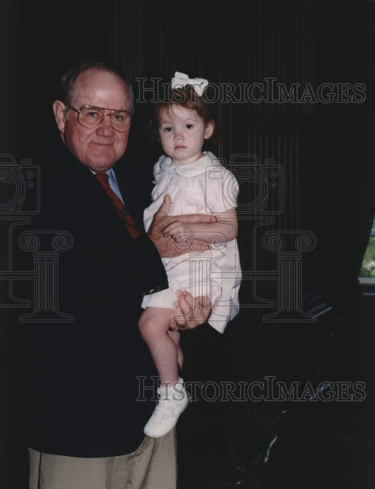 Elderly man holding a child, Alabama - Historic Images