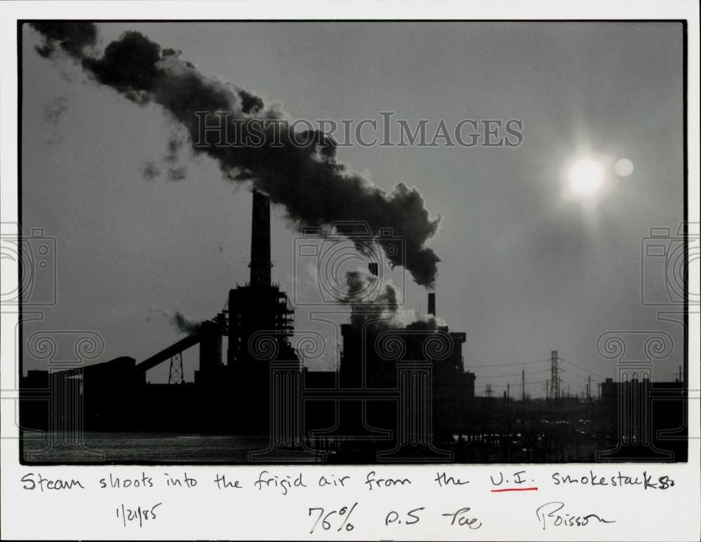 1985 Press Photo Steam released from U.I. Power Plant Smokestacks - ctaa25943 - Historic Images