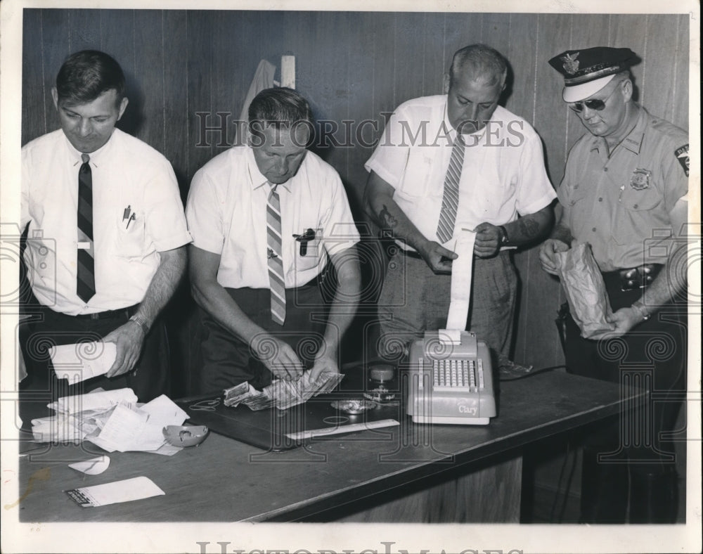 1966 Counting Cash and Checking adding machines Clarence Bennett, Leonard Benedict, Mart-Historic Images