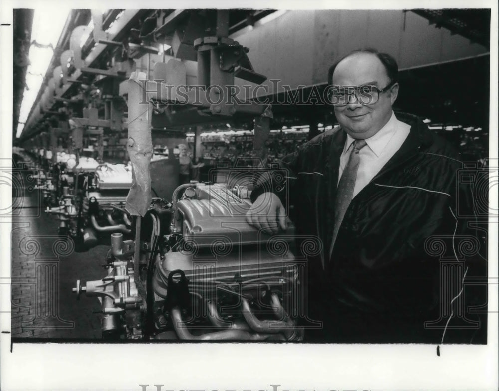 1988 Ford Engine Plant Manager Gifford Brown With Engine in Plant - Historic Images