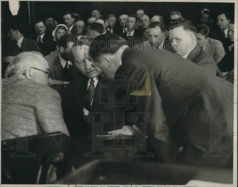 1931 Press Photo Benders lawyers in conference, Bender in background - cva04444 - Historic Images