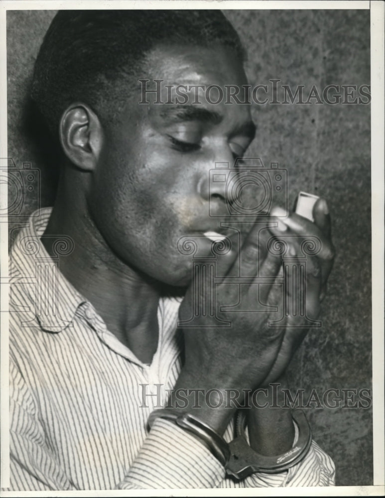 1936 Press Photo Booker Johnson calmly puffed a cigaret in Belmont County Jail - Historic Images