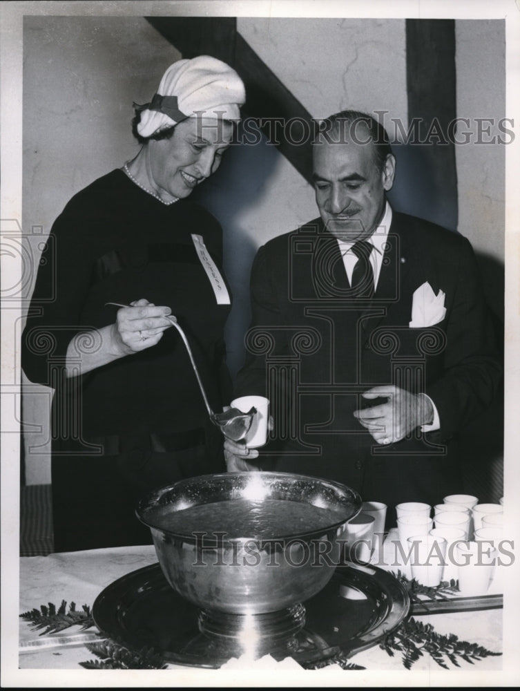 1961 Press Photo Miss Albina Cermak defeated mayoral candidate pours fruit punch - Historic Images