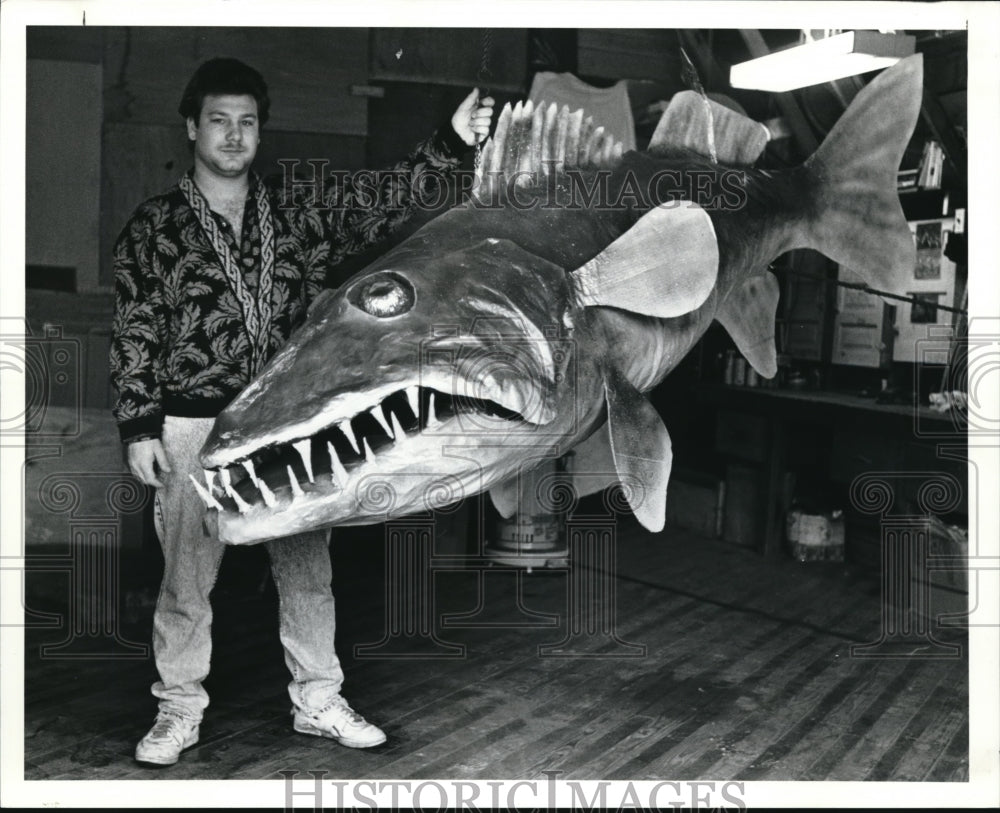 1990 Media Photo Artist Andre Cuthrell and the 10 foot Walleye he made - Historic Images