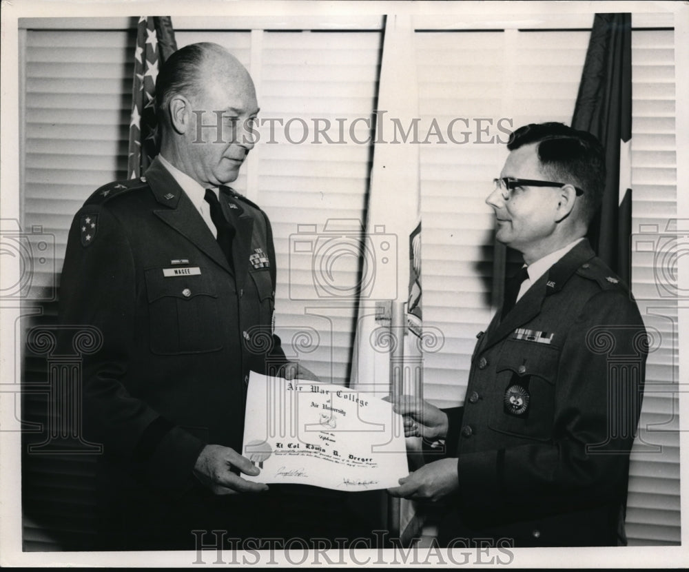 1967, Lt. Col Edwin K. Dreger receives a diploma - cva10796 - Historic Images