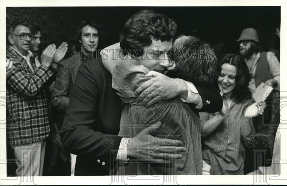 1980 Press Photo Timothy F. Hagan Hugging Unidentified Person - Historic Images