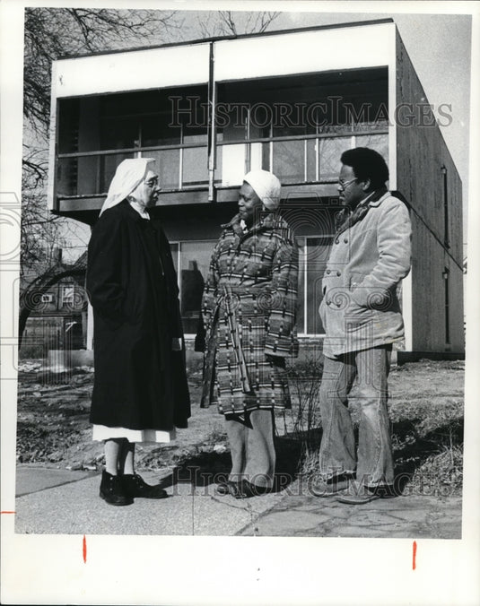 1975, Sister Henrietta with Mr and Mrs James Williams in their home - Historic Images