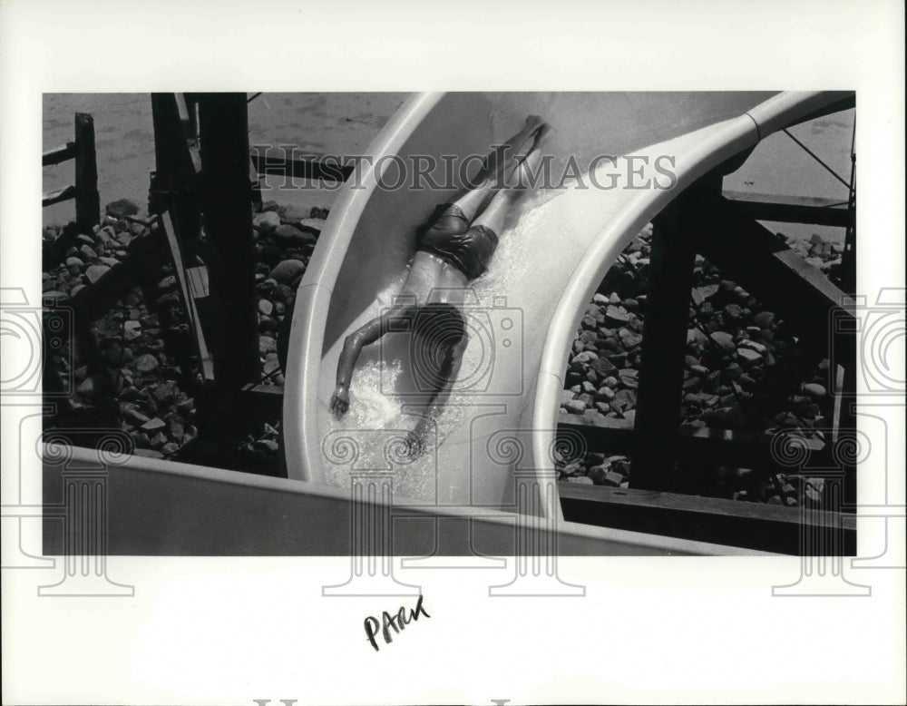 1983 Press Photo Person Going Down Geauga Lake Water Slide - cva19667 - Historic Images