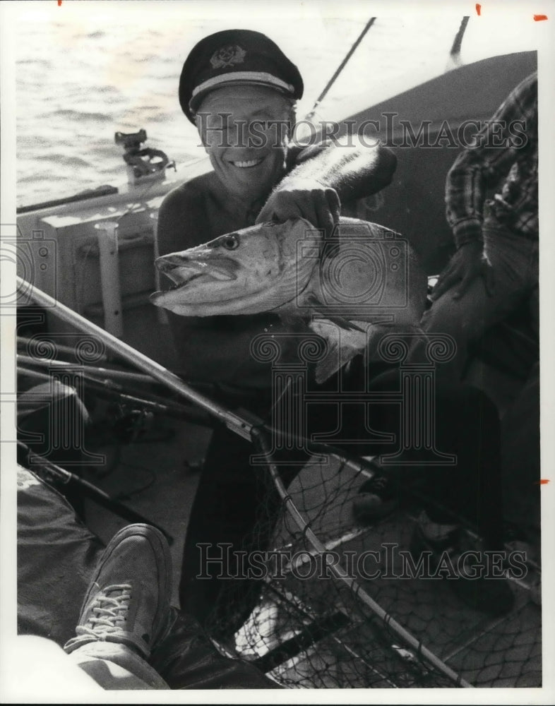 1981, Hank Bradley with the new caught fish - Historic Images