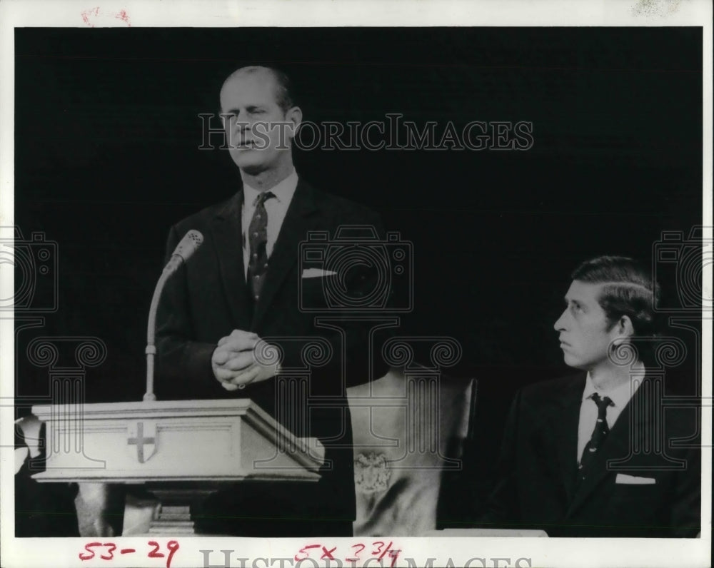 1974, Royal family of England Prince Philip &amp; son Charles looking on - Historic Images