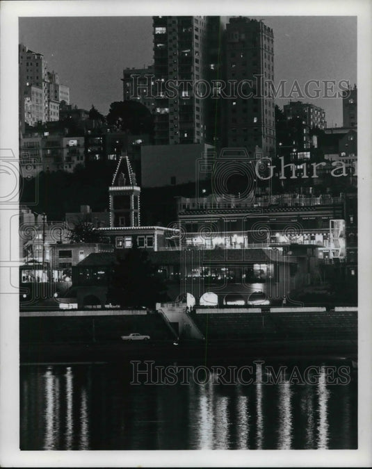 Press Photo Lights at Ghirardelli Square in San Francisco's Aquatic park lagoon - Historic Images