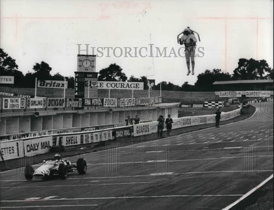 1966 Press Photo Rocketman learns he needs more acceleration to top a sportscar - Historic Images