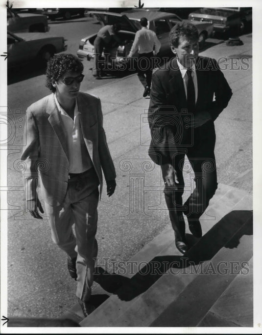 1986 Press Photo Bernie Kosar and Gary Danielson at Don Rodgers Memorial Service - Historic Images
