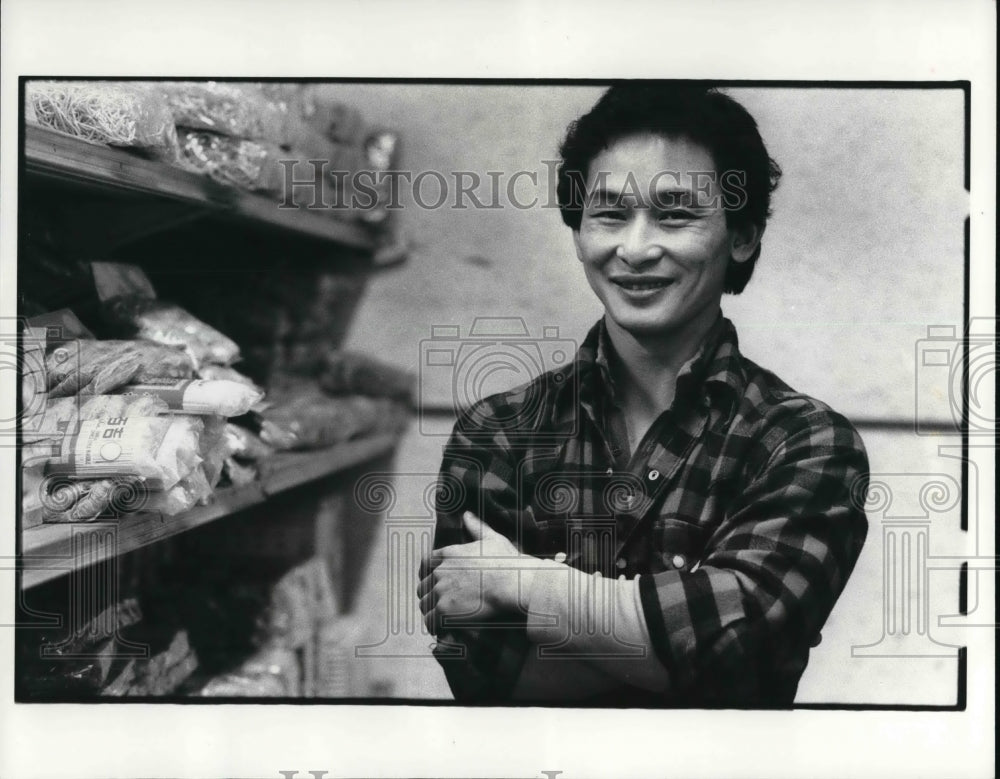 1983 Press Photo John Louie, Proprietor of Hall One Chines Imports on St. Clair - Historic Images