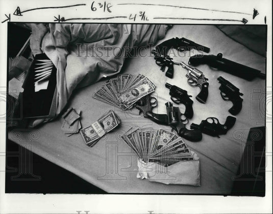 1984 Press Photo Guns, dope and money confiscated in the John Mills' home - Historic Images