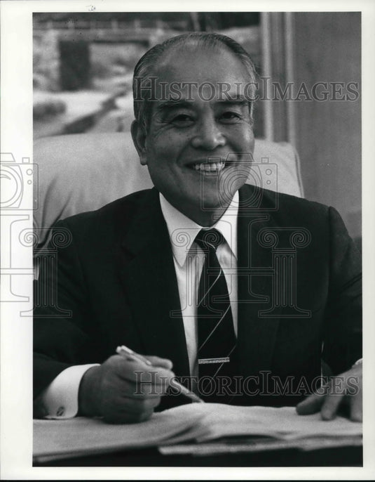 1990 Press Photo Teiji Eguchi, Chairman of Bridgestone/Firestone Tire Co. - Historic Images