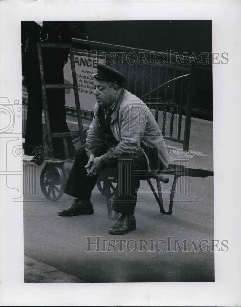 1970, Man wait for train at Cannes France - Historic Images