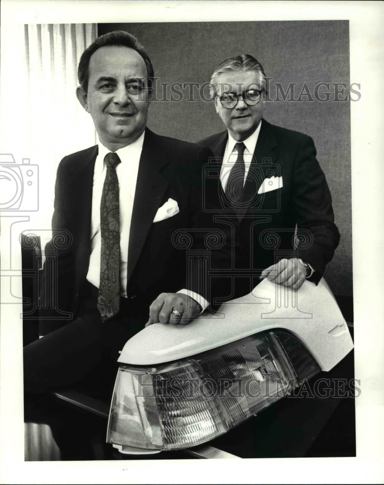 1987, Anthony Martino poses with Charles Walton, Sudbury Holdings CEO - Historic Images