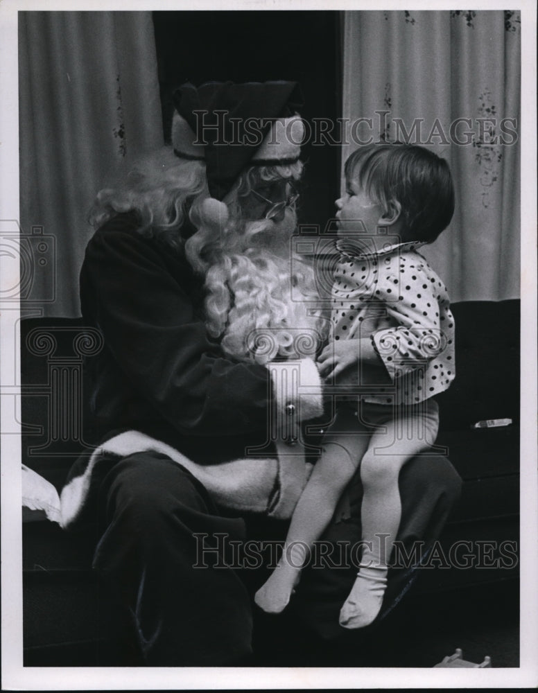 1967 Two year old Debbie Bond with Santa Claus, Donald Milburn - Historic Images