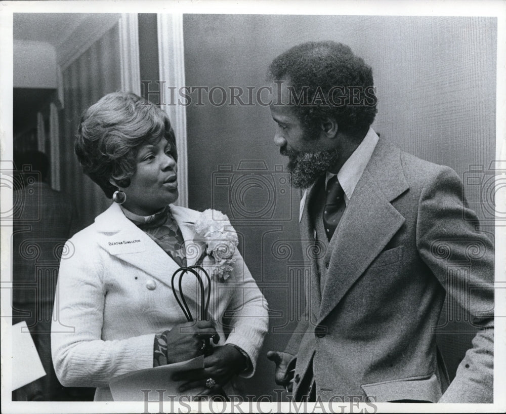 1974, Bertha Sinleton of the Urban League talking to Lerone Bennett - Historic Images