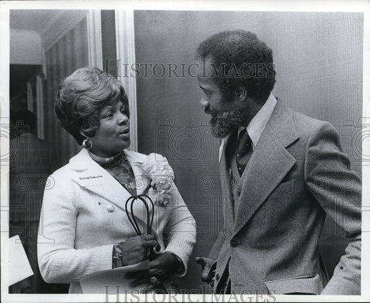 1974, Bertha Sinleton of the Urban League talking to Lerone Bennett - Historic Images