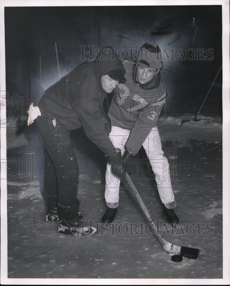 1970 Paul W. Smith and Ken McCollough Plays Hockey in Wickliffe - Historic Images