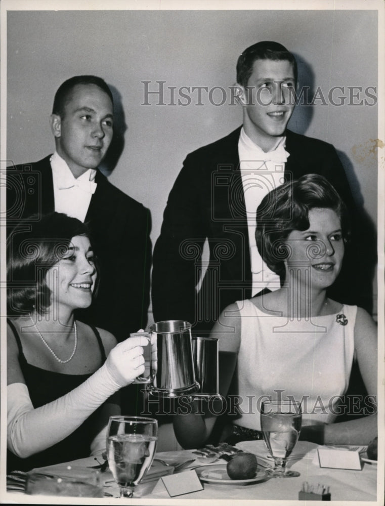1963 Toasting the New Year Diane Burton,Elizabeth Dough with escorts - Historic Images