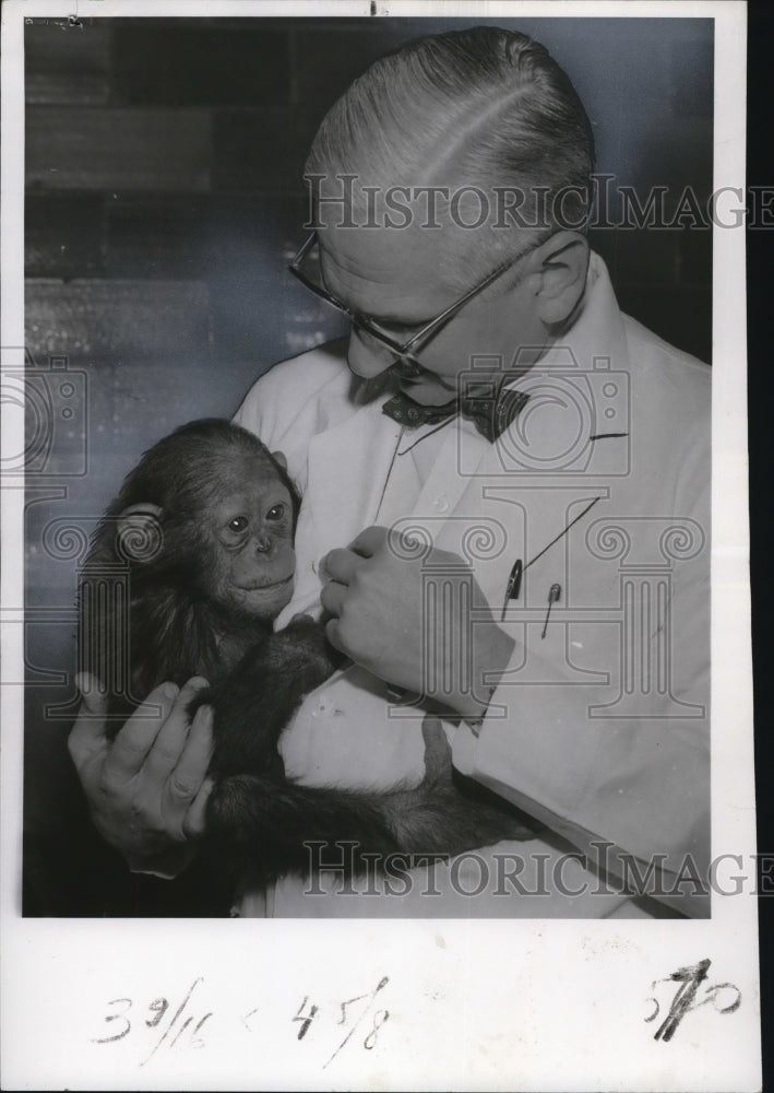 1956 Dr.Albert B.Sabin with a bottle with tissue form monkey Kidney. - Historic Images