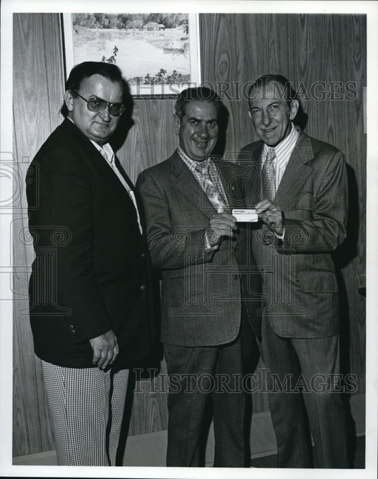 Undated Tony Granata presents honorary membership card in Cleveland - Historic Images