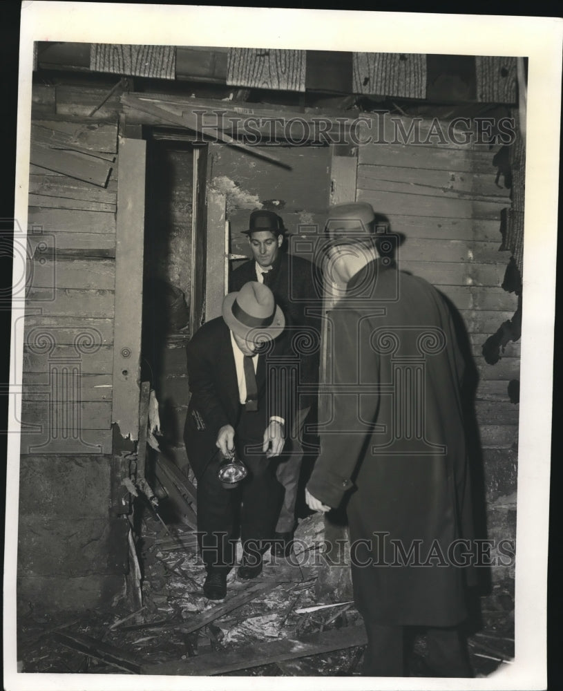 1960 Police Inspect Bomb Shattered Doorway in a House - Historic Images