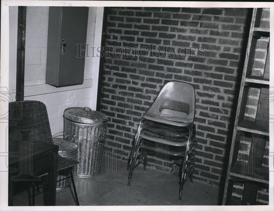 1961 The interior of the fallout shelter with tools and cabinet - Historic Images