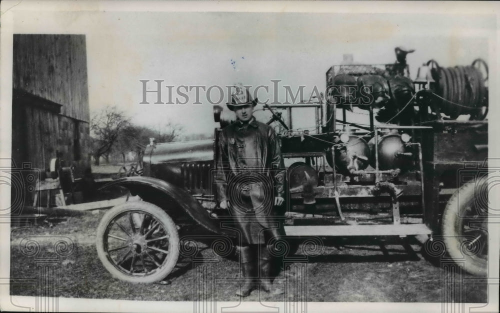 1971, Former Fire Chief Elmer Taylor in early 1920 with fire engines - Historic Images