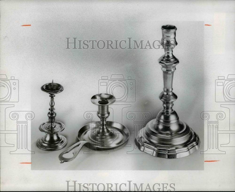 1975, The brass candlesticks in the Louis Xiv style - Historic Images