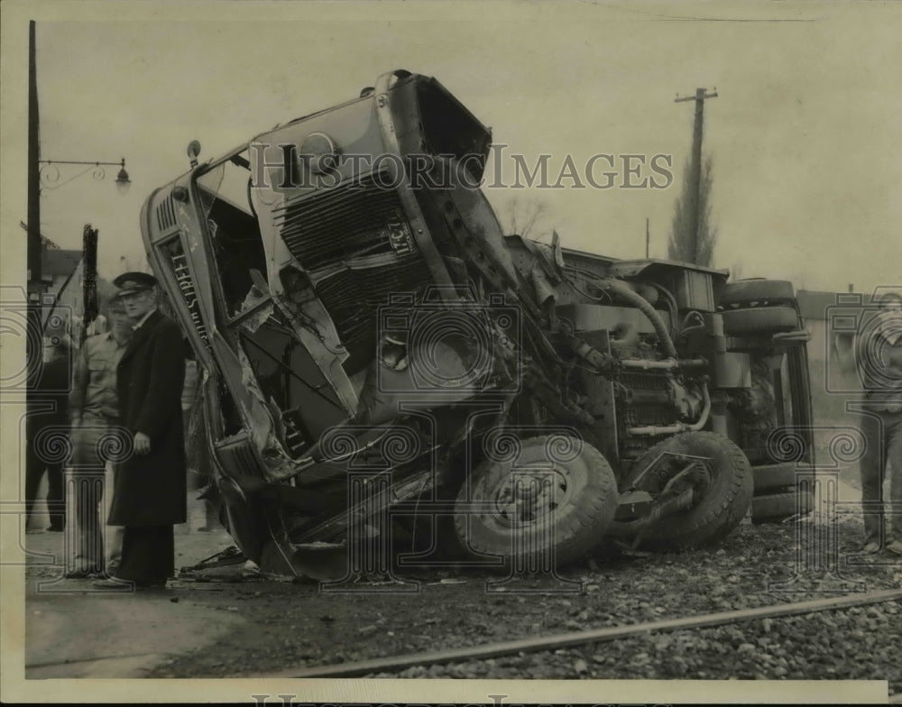 1940 Wreckage of the stalled bus struck by a train - Historic Images