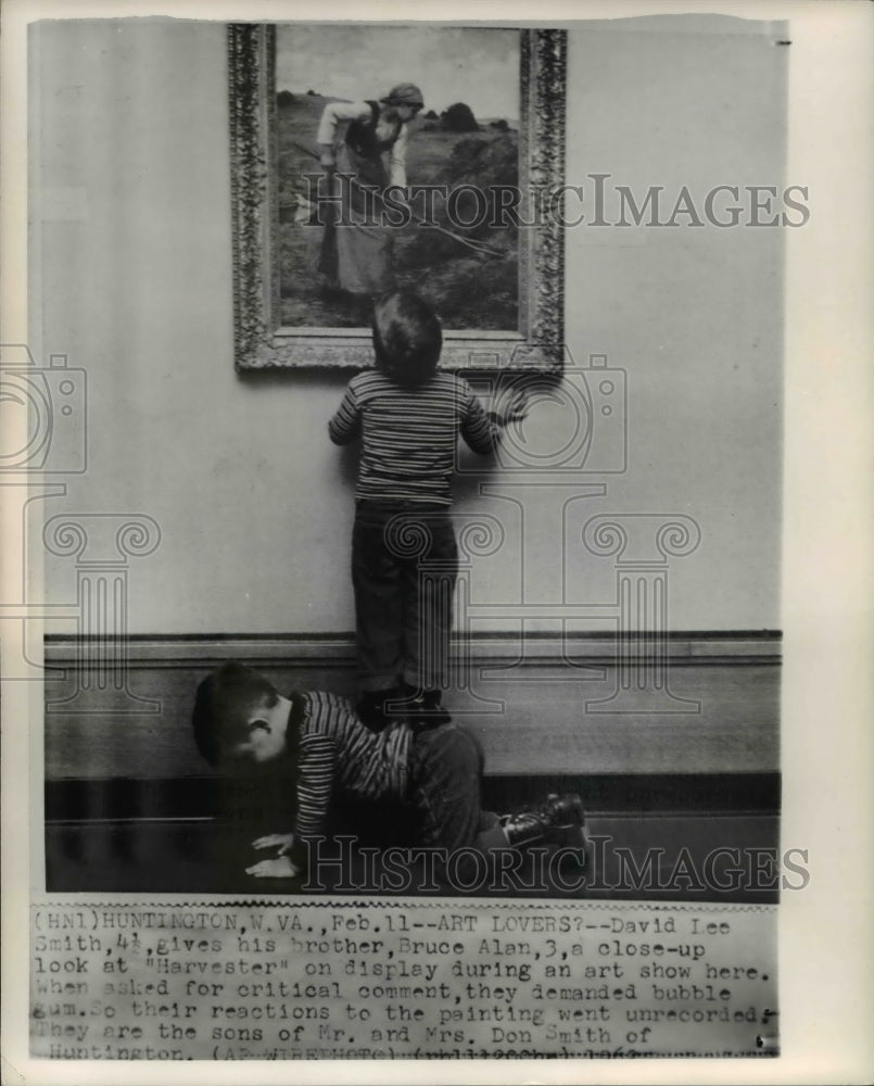 1962 Press Photo David Lee Smith & brother Bruce Alan checking the Harvester - Historic Images