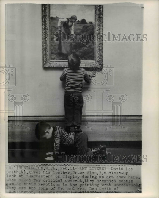 1962 Press Photo David Lee Smith & brother Bruce Alan checking the Harvester - Historic Images