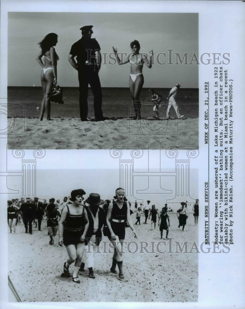 1922 Press Photo Women are ushered off a Lake Michigan beach in 1922 - Historic Images