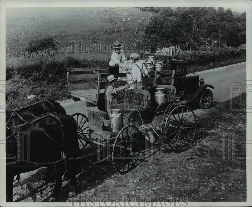 1965 Delivering milk to truck of milk route - Historic Images