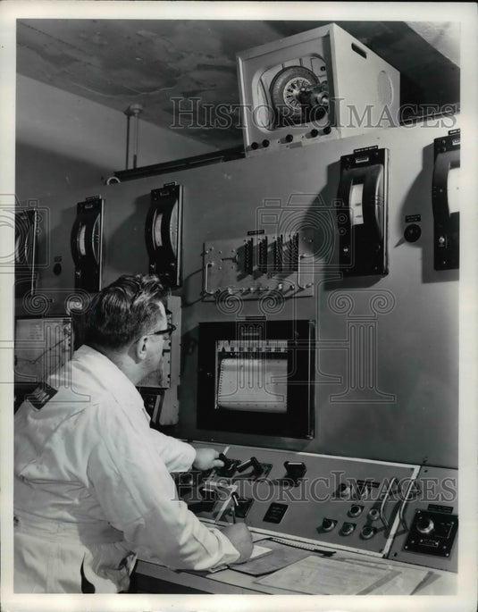 1966, The Firestone technician uses a closed circuit television - Historic Images
