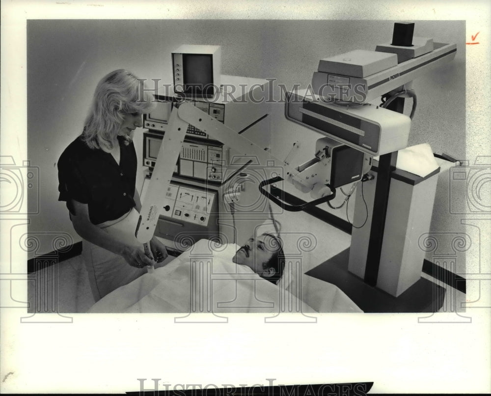 1960 Testing out the new medical equip - Historic Images