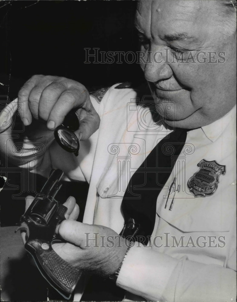 1972 Press Photo Lt. Michael Roth inspects Revolver Parts made in Brazil - Historic Images