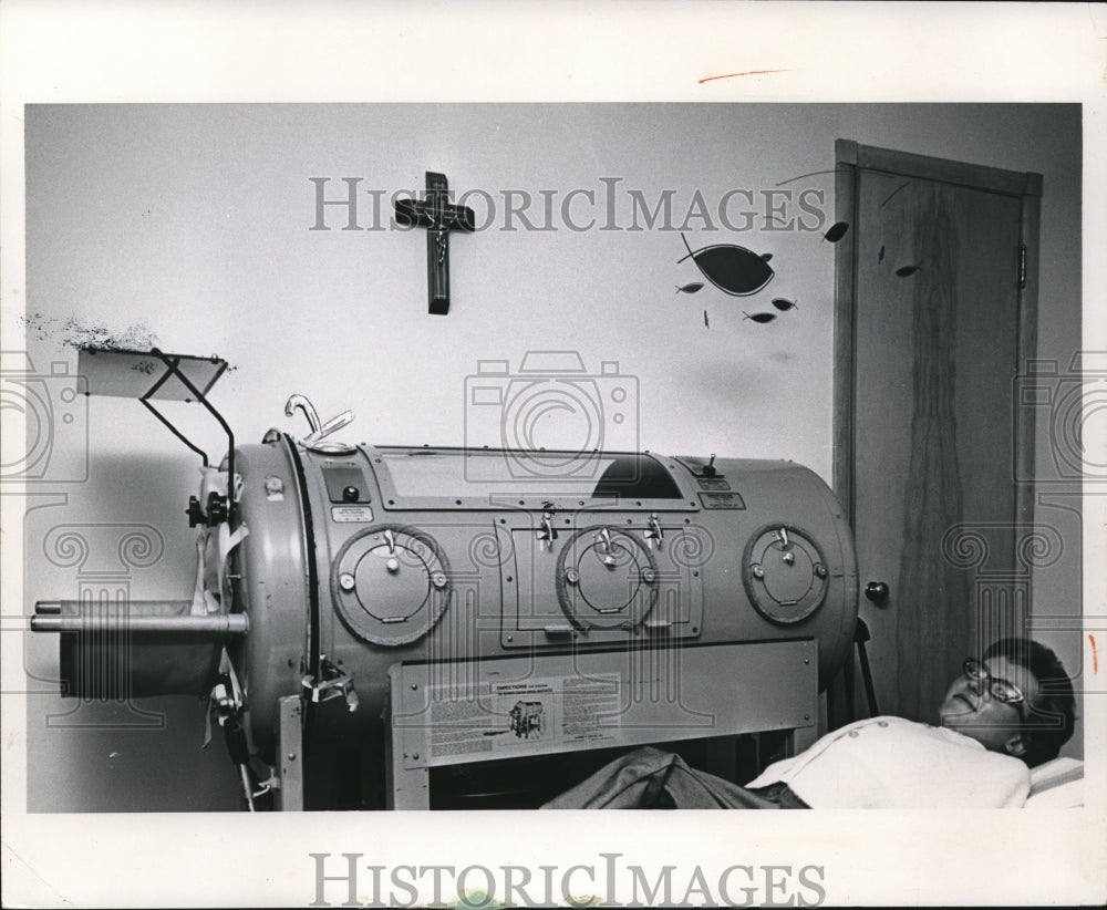 1966 Susan Armbrecht using her Iron Lung at night - Historic Images