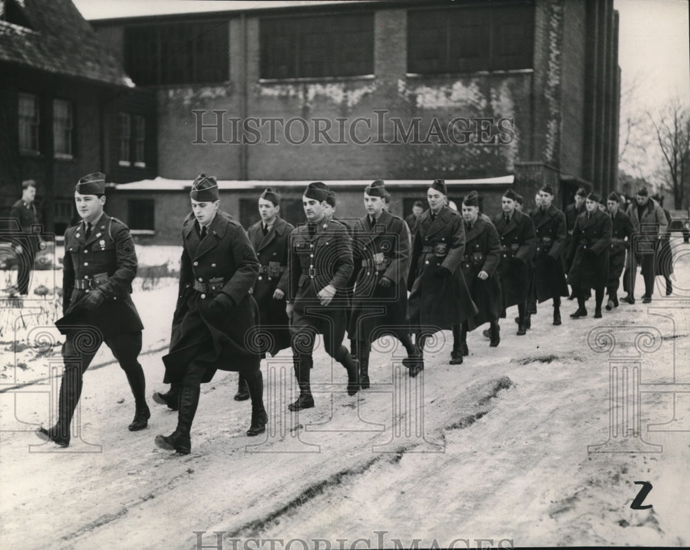 1941 Press Photo Members of Headquarters Troop marching through the snow.-Historic Images