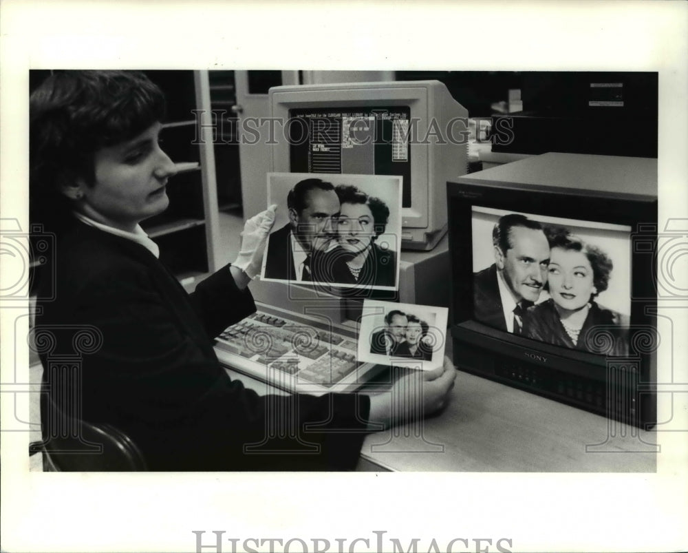 1990 Press Photo Photographs in a Computerized Data Base - cva65547 - Historic Images